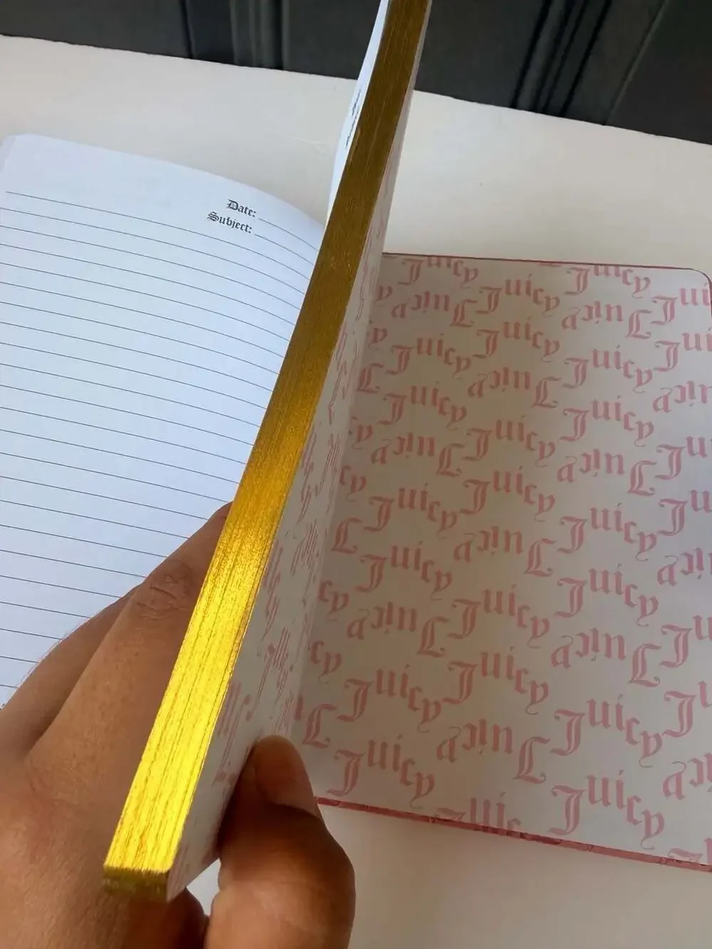 NWT Juicy Couture pink and black journal with diamond-topped pen. GOLD